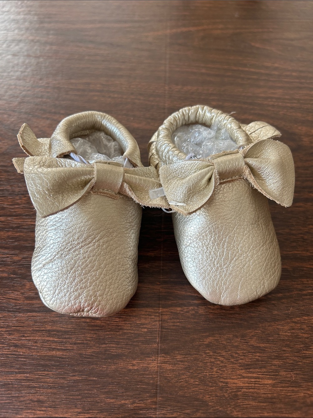 Gold Leather Bow Baby Moccasins